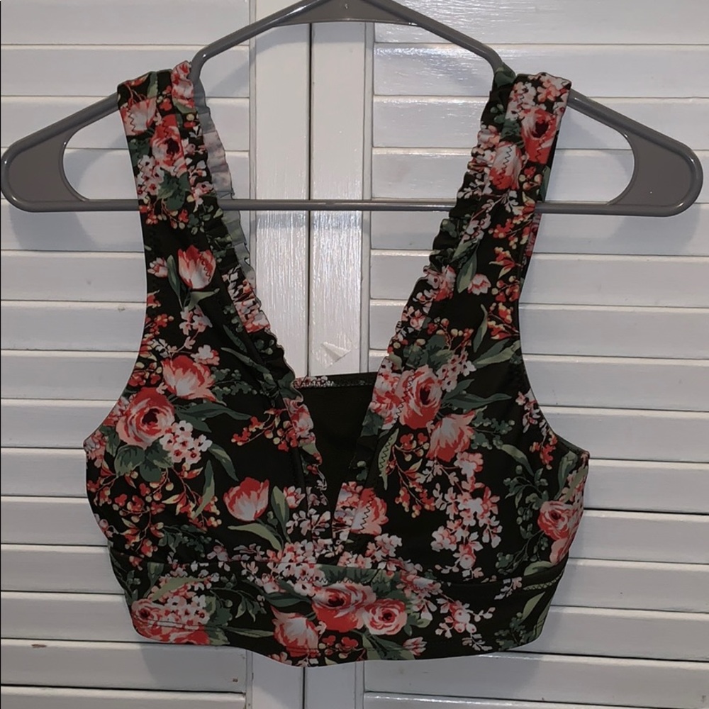 medium women’s bathing suit top. floral pattern.